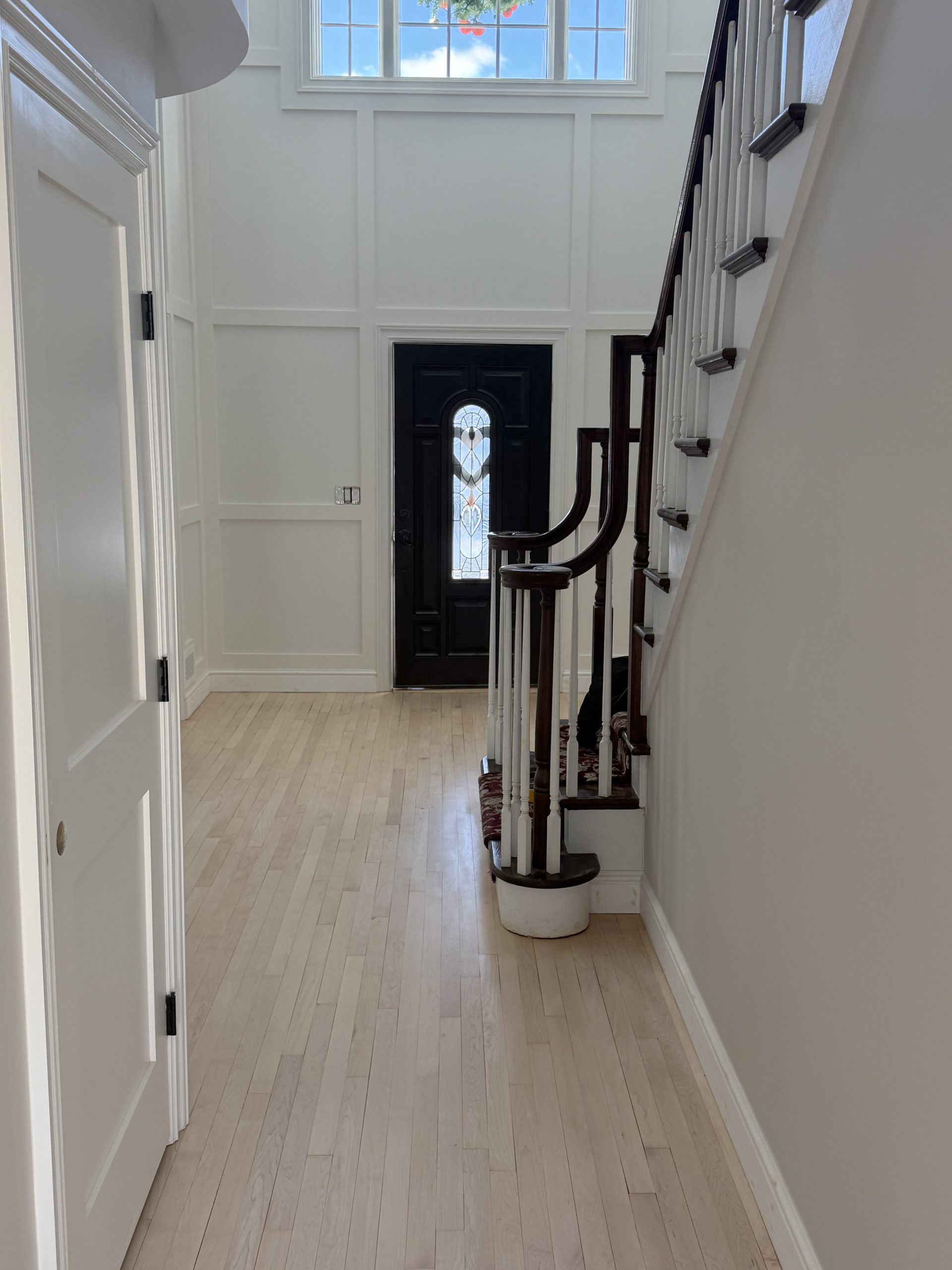 Finished hardwood floors in a bright home interior
